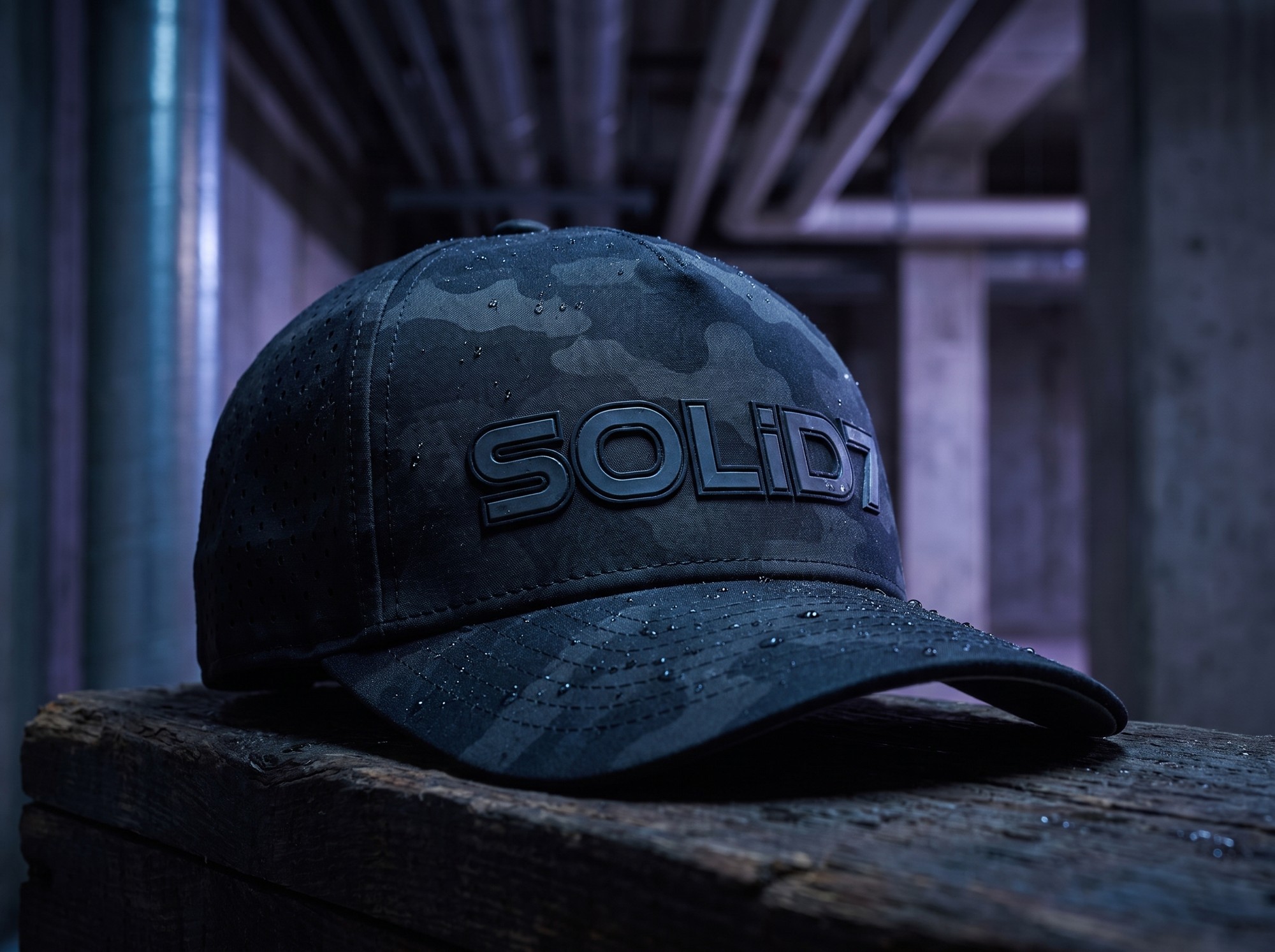 Bespoke navy SOLID7 camo cap in a moody studio
